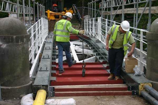 Decking plates being installed