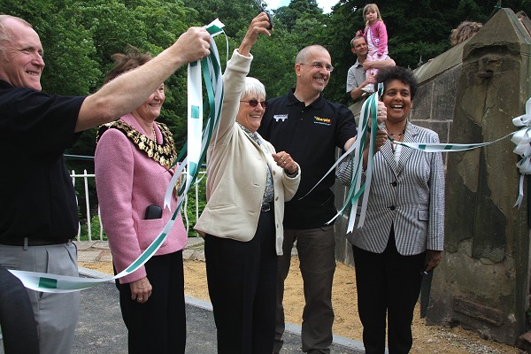 Peter Clarke, Stockport Mayor Pam King, Ann Hearle, Mark Whittaker and Cllr Shan Alexander celebrate the cutting of the ribbon.