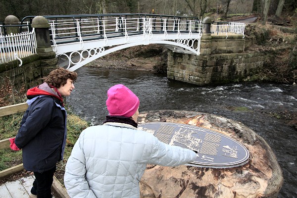 The new bronze plaque is in position