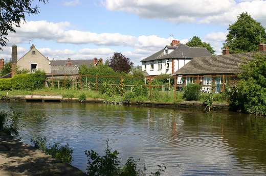 Smithy Cottage to the left and the site of Black Wharf today